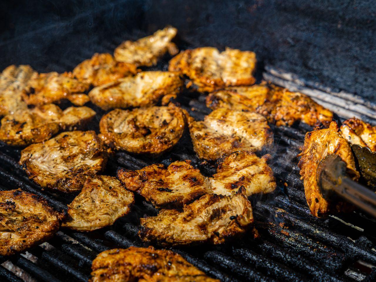 Drum-grill jerk chicken and nightly live reggae at Bourbon Beach