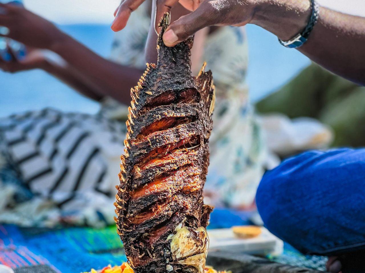 Steam fish, okra, and bammy by the sea at Sharkies Seafood Restaurant
